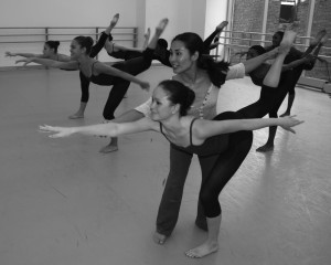 Corinne Nagata assists her ballet student in an attitude position.