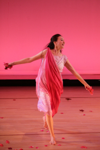 solo female dancer in pink in pink background