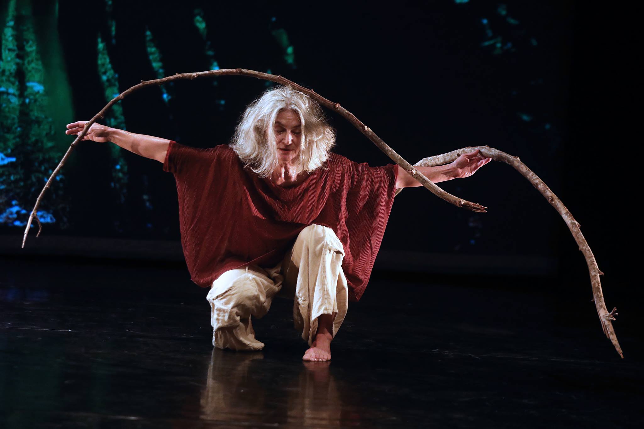 Solo elderly woman dancing on stage