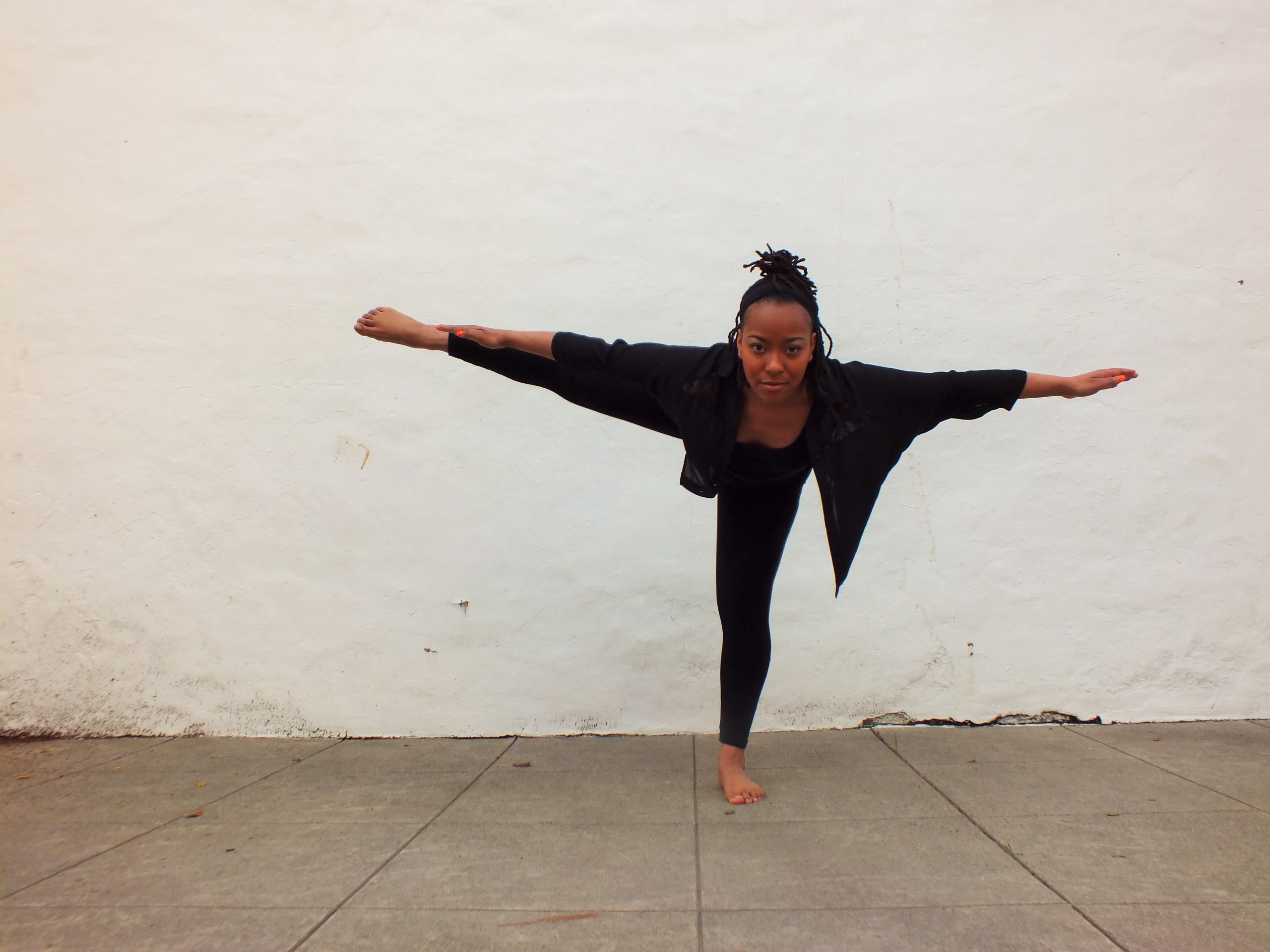 Outdoor dance photo of Joslynn Mathis Reed balancing on one leg
