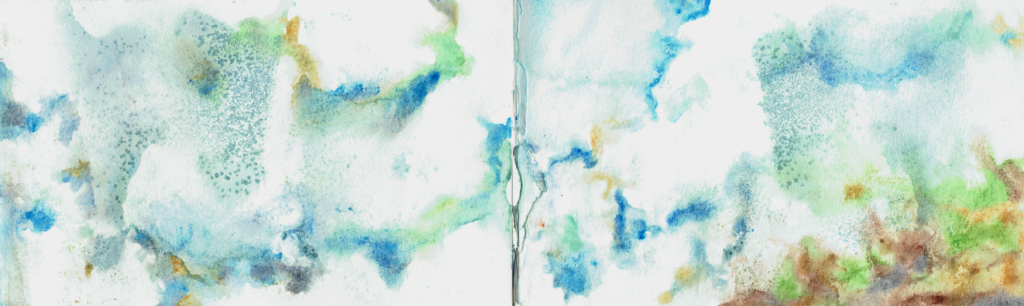 A formless watercolor painting of blue, green, and brown, on white, speckled with sand, with a seam of torn pages down the middle