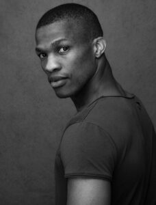 Black and white professional profile picture of Lwando Dutyulwa