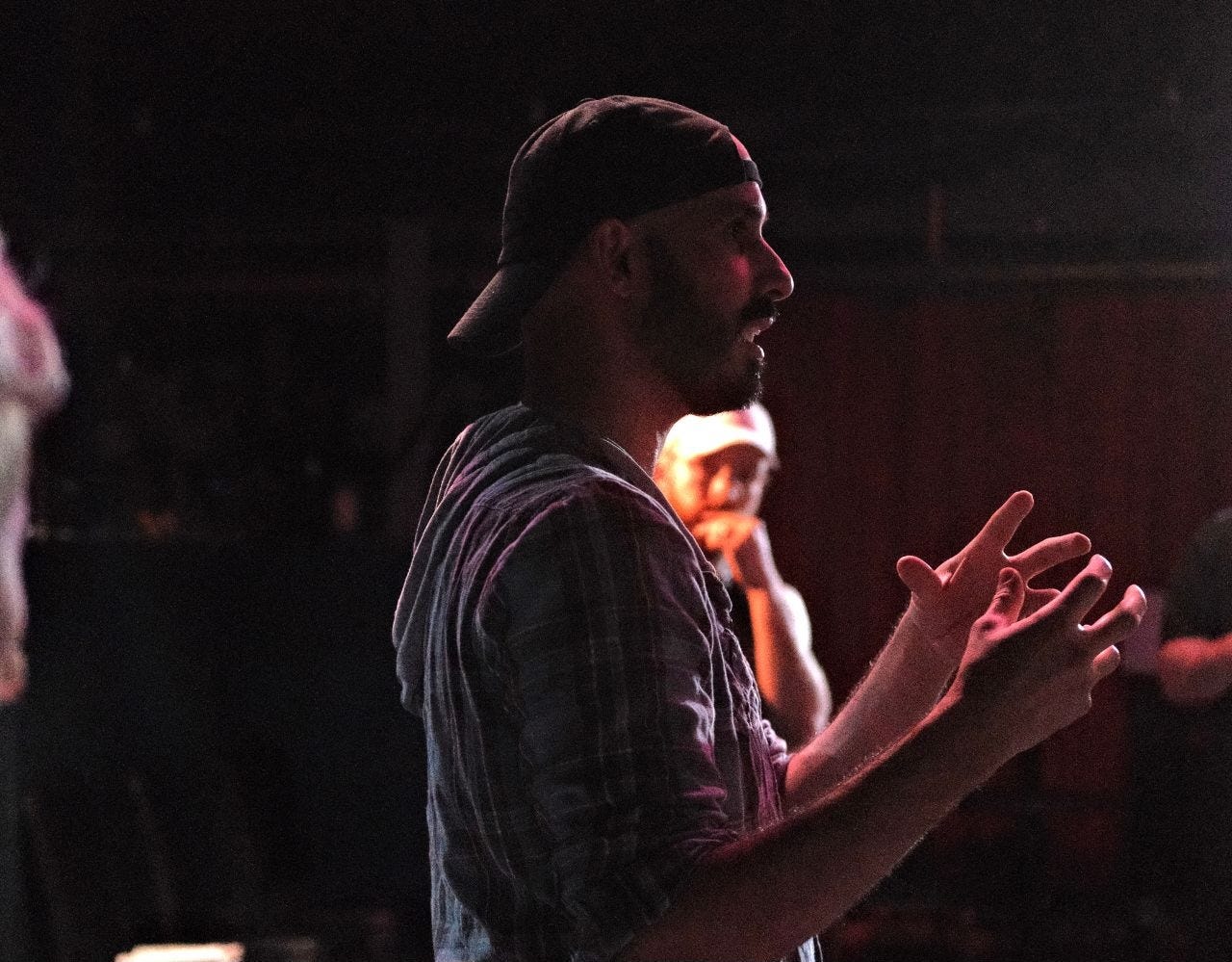 Detour Productions’ Co-Artistic Director Eric Garcia rehearsing We Build Houses Here. Photo credit: Danny Hernandez.