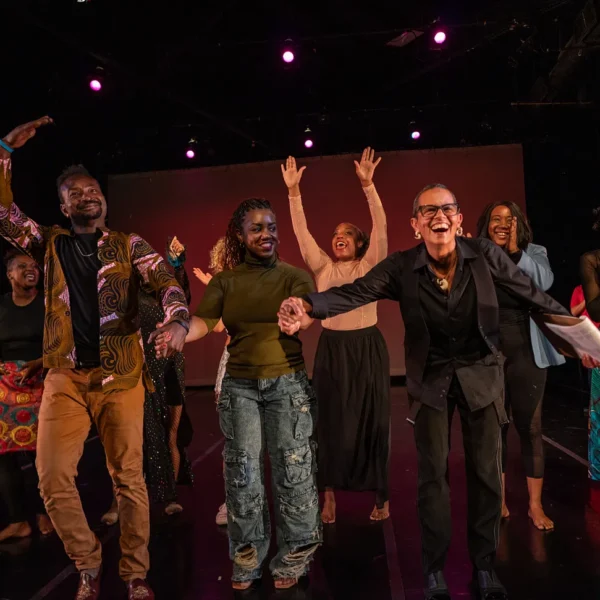 Sarah Crowell (bowing with the big smile on the right) at Soul Stories, the annual showcase that closes each Liberation Academy season. Sarah co-founded the Liberation Academy at Dance Mission. Photo courtesy of Dance Brigade.