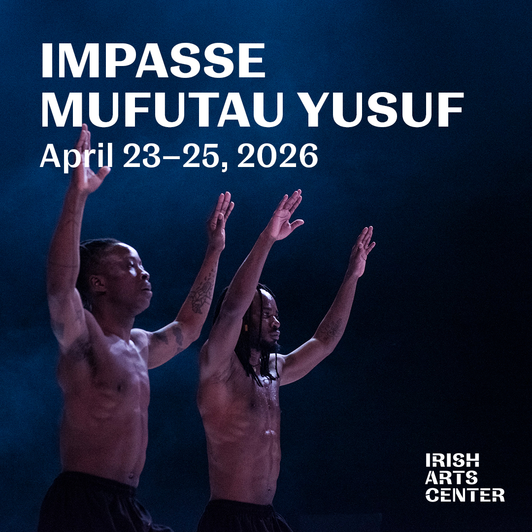 An image of two shirtless people with their arms raised above their heads.