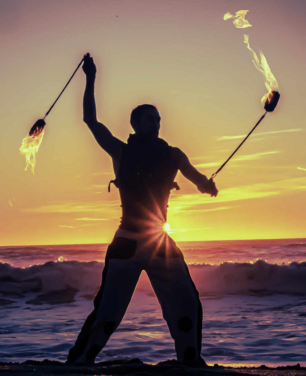 Sunset beach fire poi silhouette 