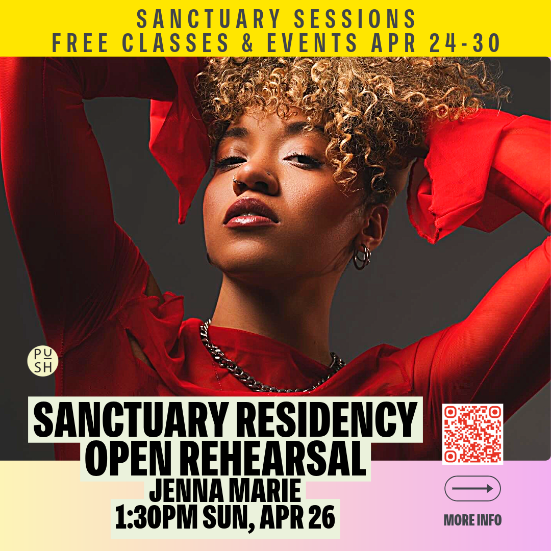 Jenna Marie poses in a red top with a silver chain, with her hands on either side of her head and staring directly at the camera.
