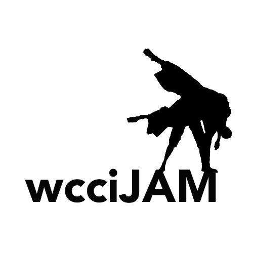 A silhouette of two dancers performing a lift. The underneath dancer stands with each foot on the A and M of the bolded word 